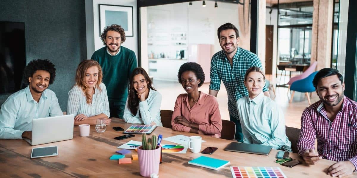 Employees together in meeting