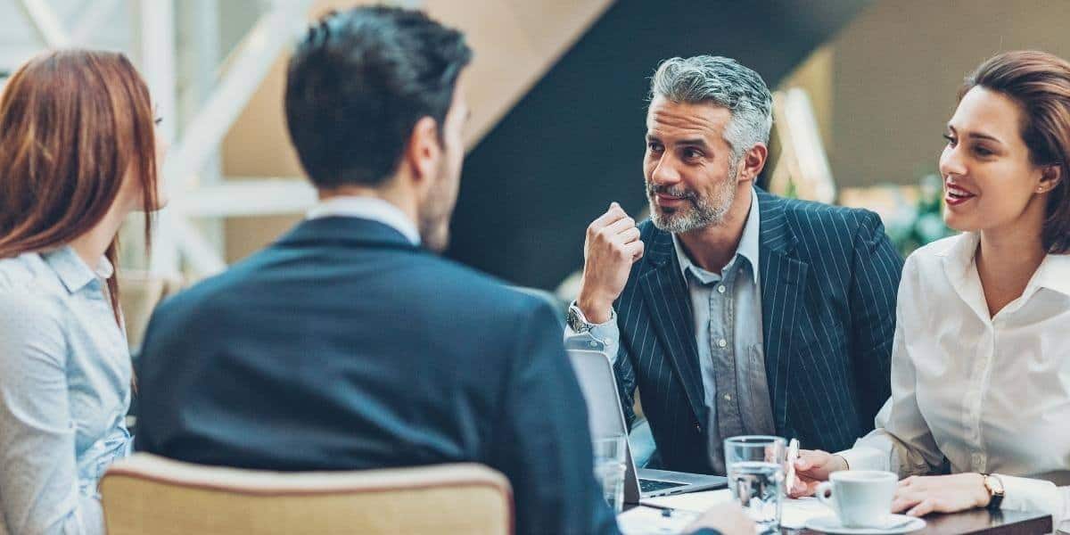 Coworkers in office meeting