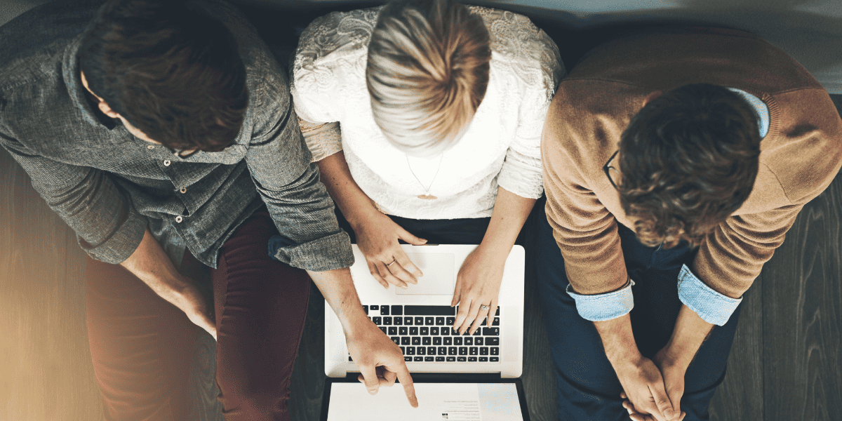 Professionals researching the typical cost of hiring an executive coach